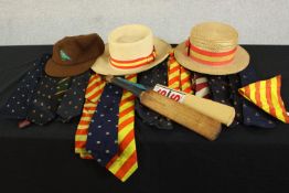 A collection of MCC clothing and memorabilia, including a panama hat, one boater, various ties,