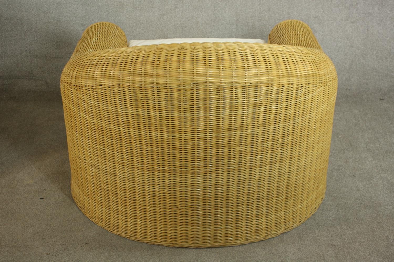 Unopiu, Italy; a pair of large Lloyd Loom type wicker tub chairs, with loose seat cushions. H.72 W. - Image 7 of 8