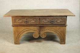 An Eastern carved hardwood side cabinet on scrolling shaped supports. H.82 W.175 D.82cm.