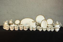 An extensive Paragon Athena pattern tea, coffee and dinner service, with gilded borders. H.42 W.