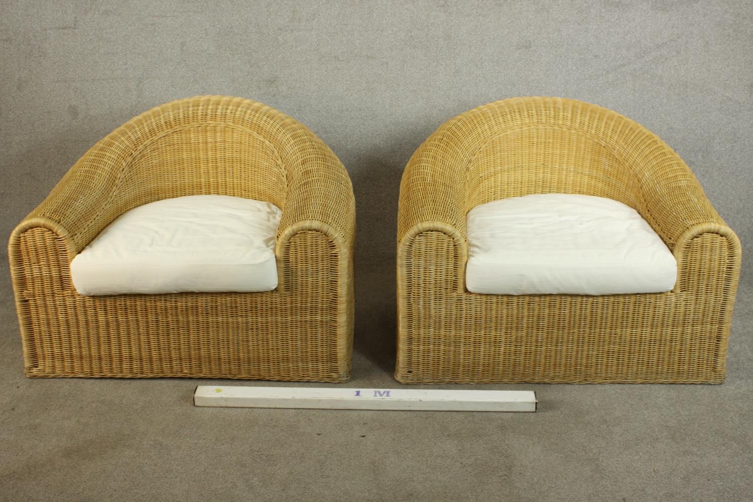 Unopiu, Italy; a pair of large Lloyd Loom type wicker tub chairs, with loose seat cushions. H.72 W. - Image 3 of 8