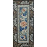 A framed and glazed 19th century Chinese silk embroidery panel, the central section depicting