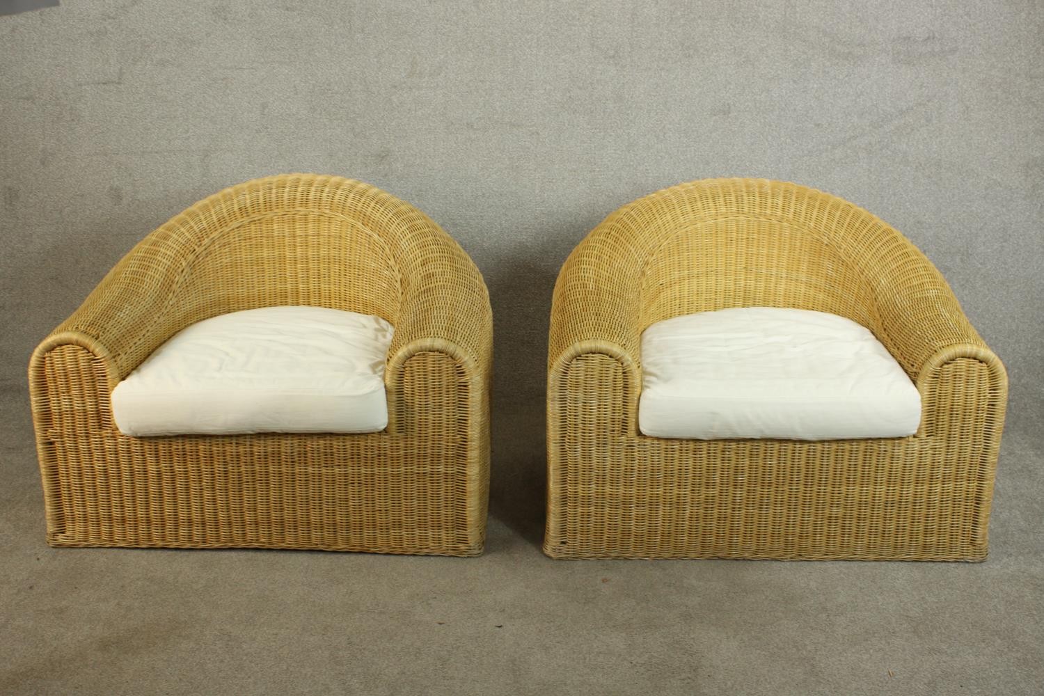 Unopiu, Italy; a pair of large Lloyd Loom type wicker tub chairs, with loose seat cushions. H.72 W. - Image 2 of 8