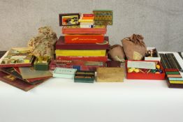 A large collection of vintage boards games and jigsaws, including Halma, Draughts, Scoop, Pegity,