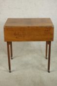 A 19th century painted grain effect Pembroke table, with two drop leaves over a single drawer, the