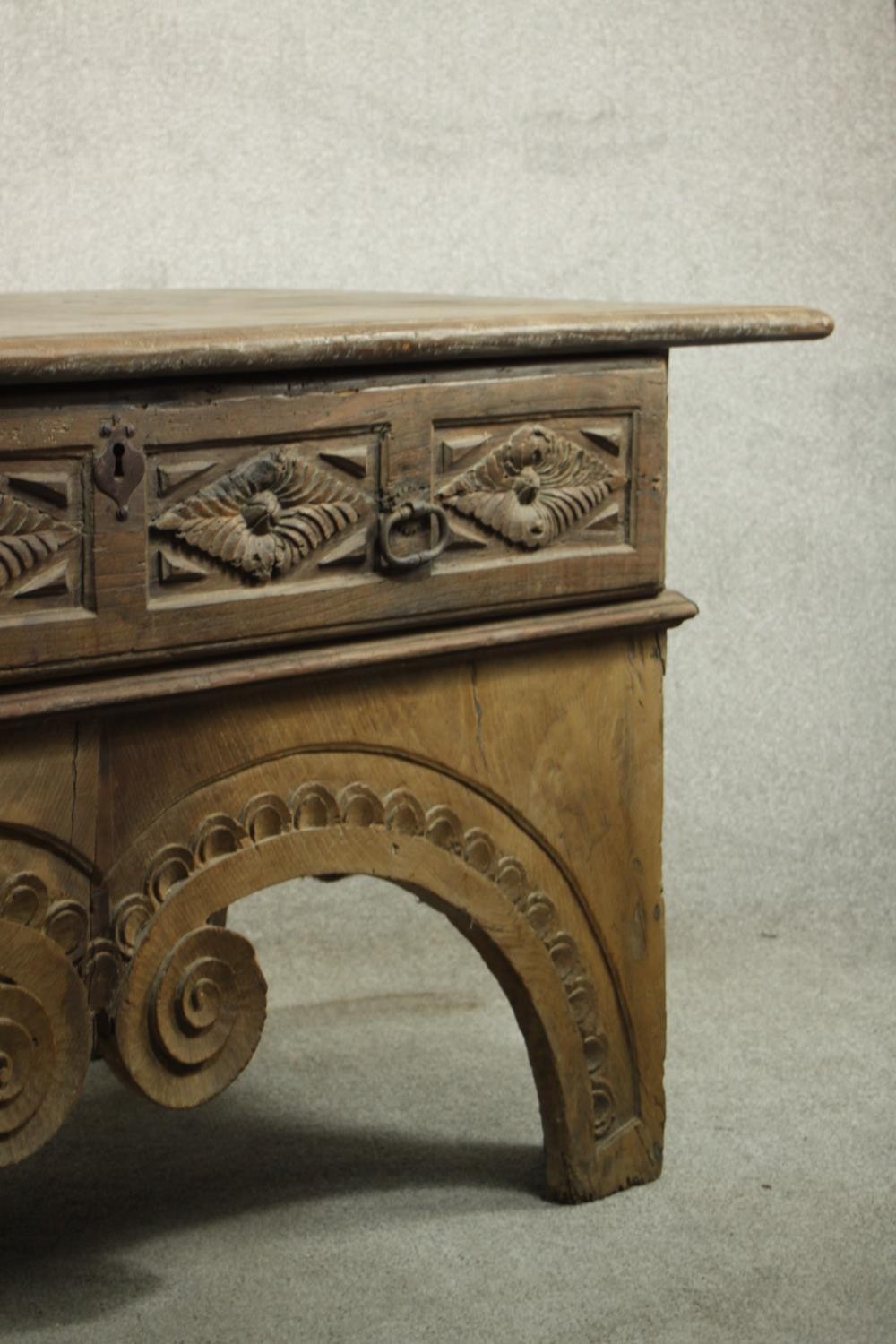 An Eastern carved hardwood side cabinet on scrolling shaped supports. H.82 W.175 D.82cm. - Image 10 of 16
