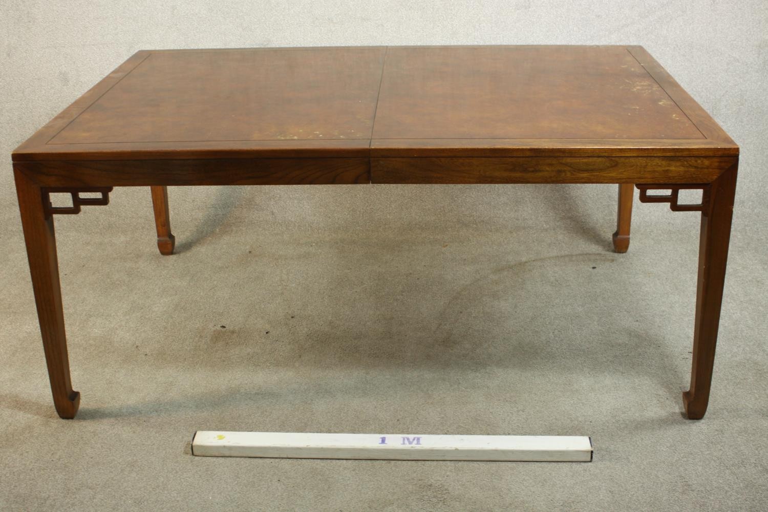 A late 20th century Chinese hardwood extending dining table, of rectangular form with two additional - Image 2 of 6