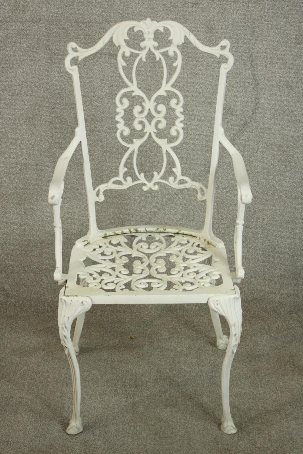 A set of six white painted cast iron carver garden chairs, with pierced splat back and open arms - Image 3 of 10