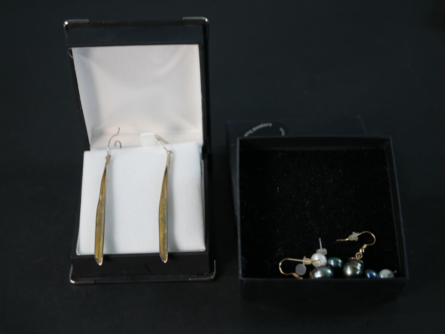 Three pairs of cultured pearl earrings and a pair of boxed leaf design contemporary white metal (