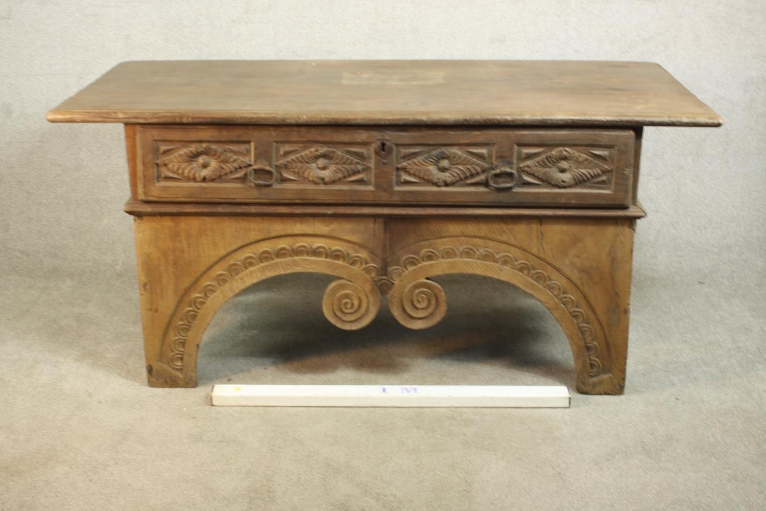 An Eastern carved hardwood side cabinet on scrolling shaped supports. H.82 W.175 D.82cm. - Image 2 of 16