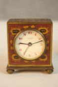 A Robert & William Sorley, Glasgow, miniature Arts and Crafts enamelled alarm clock, white enamel
