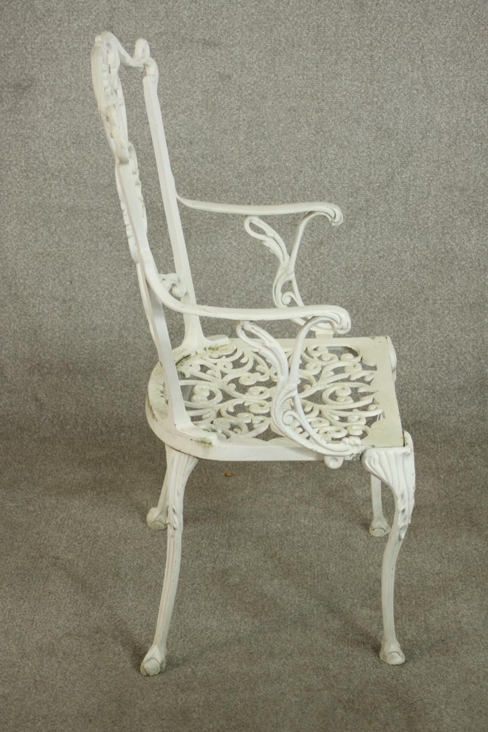 A set of six white painted cast iron carver garden chairs, with pierced splat back and open arms - Image 6 of 10