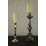 Two repousse silver plated candlesticks converted into table lamps. H.57 W.15 D.15cm. (largest)