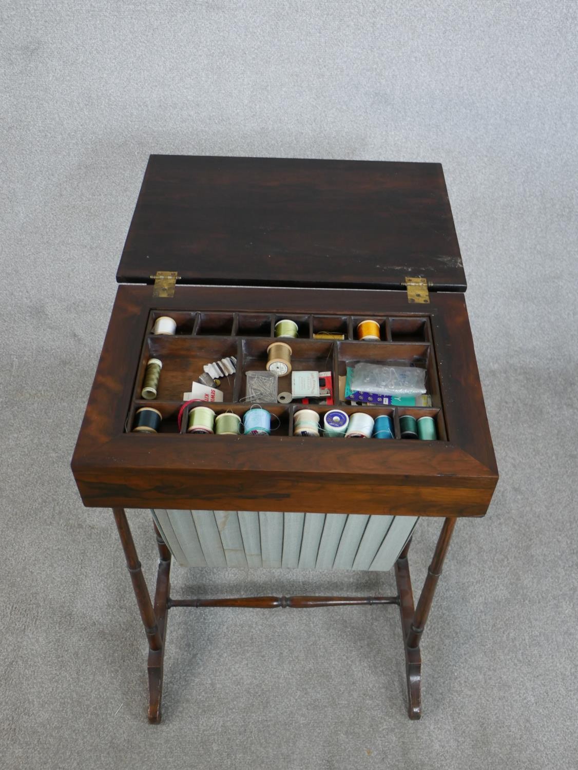 A 19th century rosewood work table, with a rectangular rising lid and fitted interior, over a - Image 4 of 9