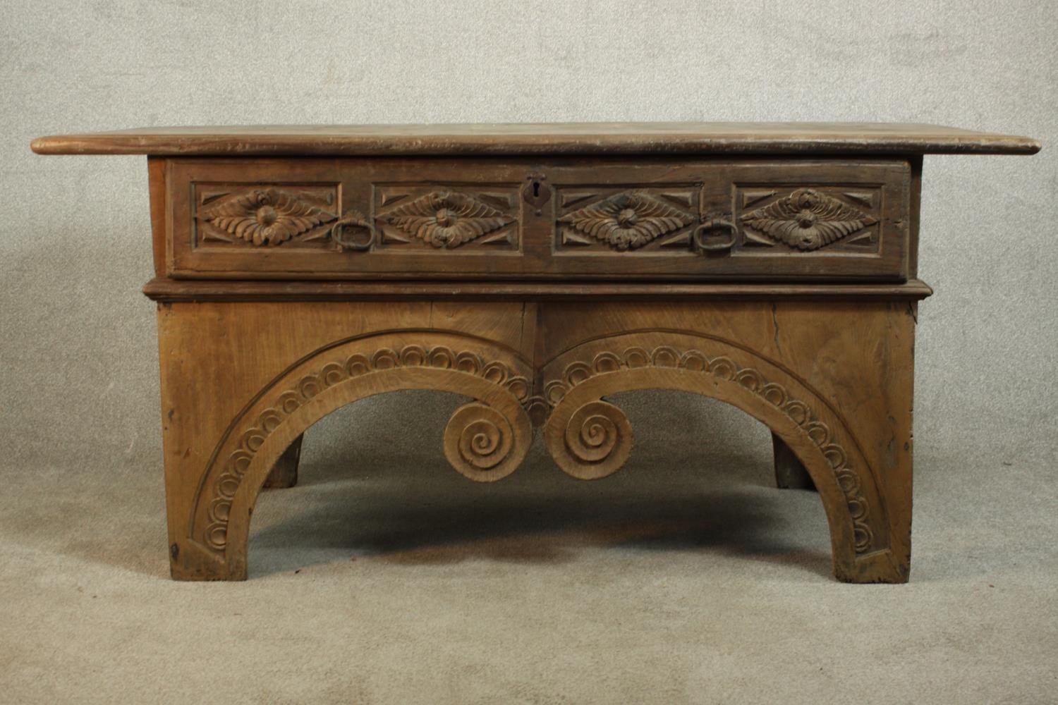 An Eastern carved hardwood side cabinet on scrolling shaped supports. H.82 W.175 D.82cm. - Image 3 of 16