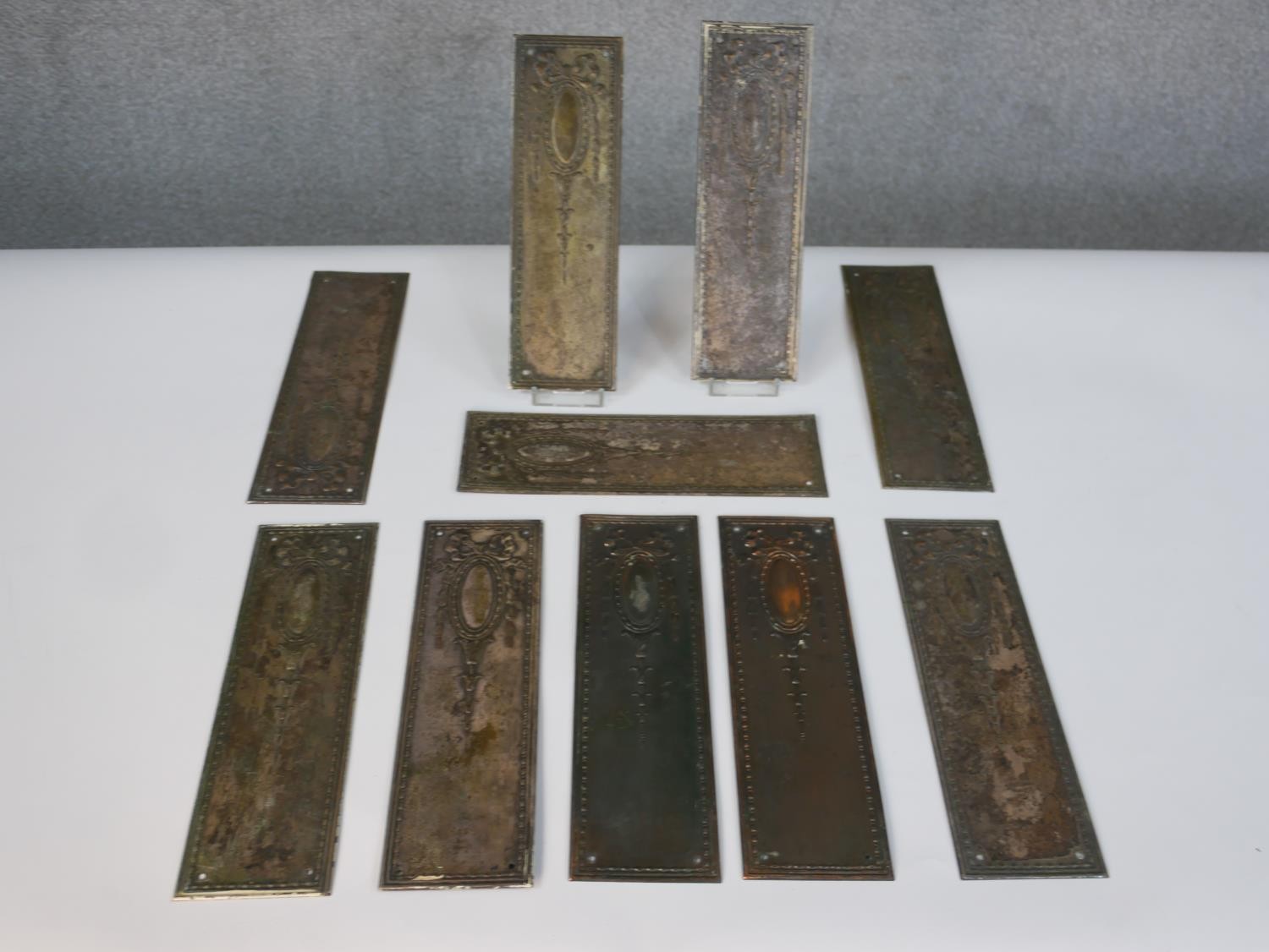 A collection of early 20th century brass and copper door decorations including a number of door - Image 6 of 7