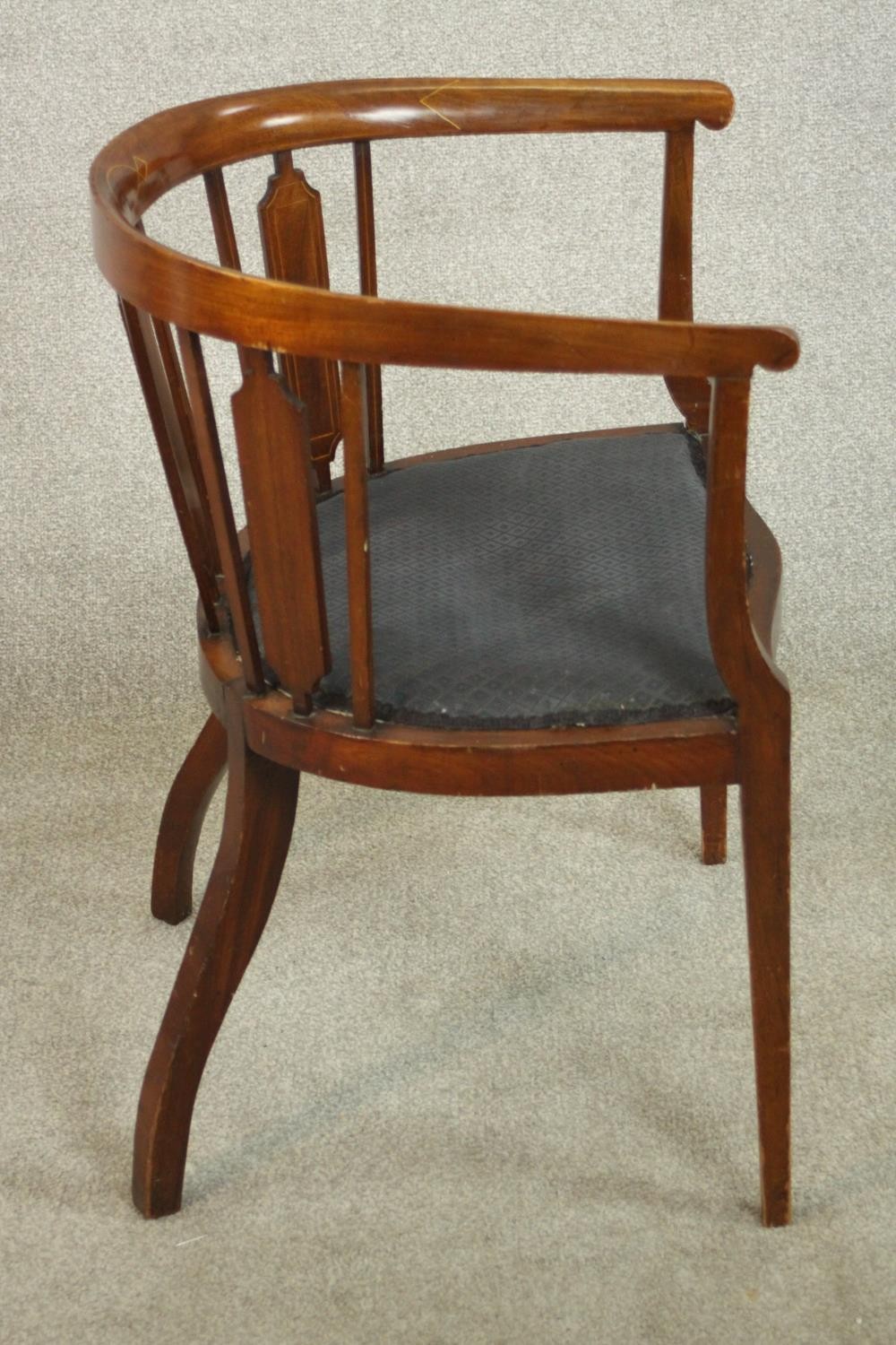 An Edwardian mahogany and inlaid tub chair, the serpentine fronted seat upholstered in dark grey - Image 3 of 7