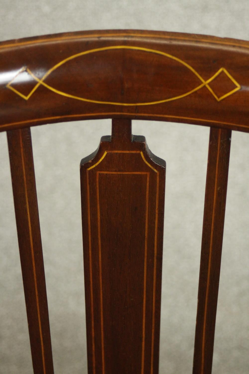 An Edwardian mahogany and inlaid tub chair, the serpentine fronted seat upholstered in dark grey - Image 5 of 7