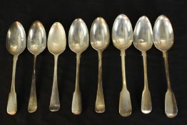 Eight 19th century silver serving spoons, including a pair of Victorian silver serving spoons (