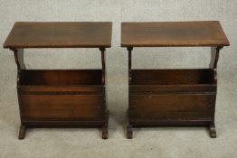 A pair of 20th century oak magazine racks, with a rectangular top over a magazine storage