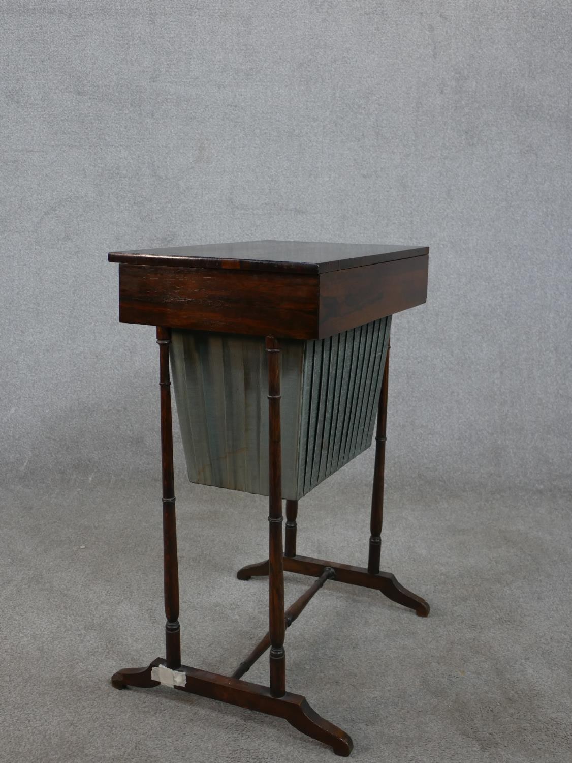 A 19th century rosewood work table, with a rectangular rising lid and fitted interior, over a - Image 8 of 9