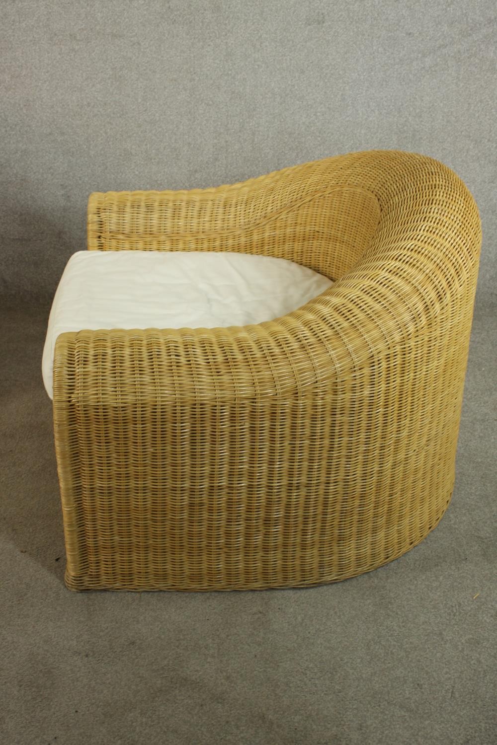 Unopiu, Italy; a pair of large Lloyd Loom type wicker tub chairs, with loose seat cushions. H.72 W. - Image 5 of 8