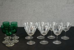 A set of five Victorian Bristol Green clear stemmed cordial glasses along with a set of etched and