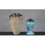 A terracotta internally glazed twin handled amphora along with a Victorian opaque blue glass oil