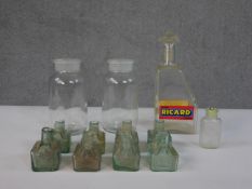 A collection eight Victorian/Edwardian salvaged ink-holders along with two apothecary jars (no lids)