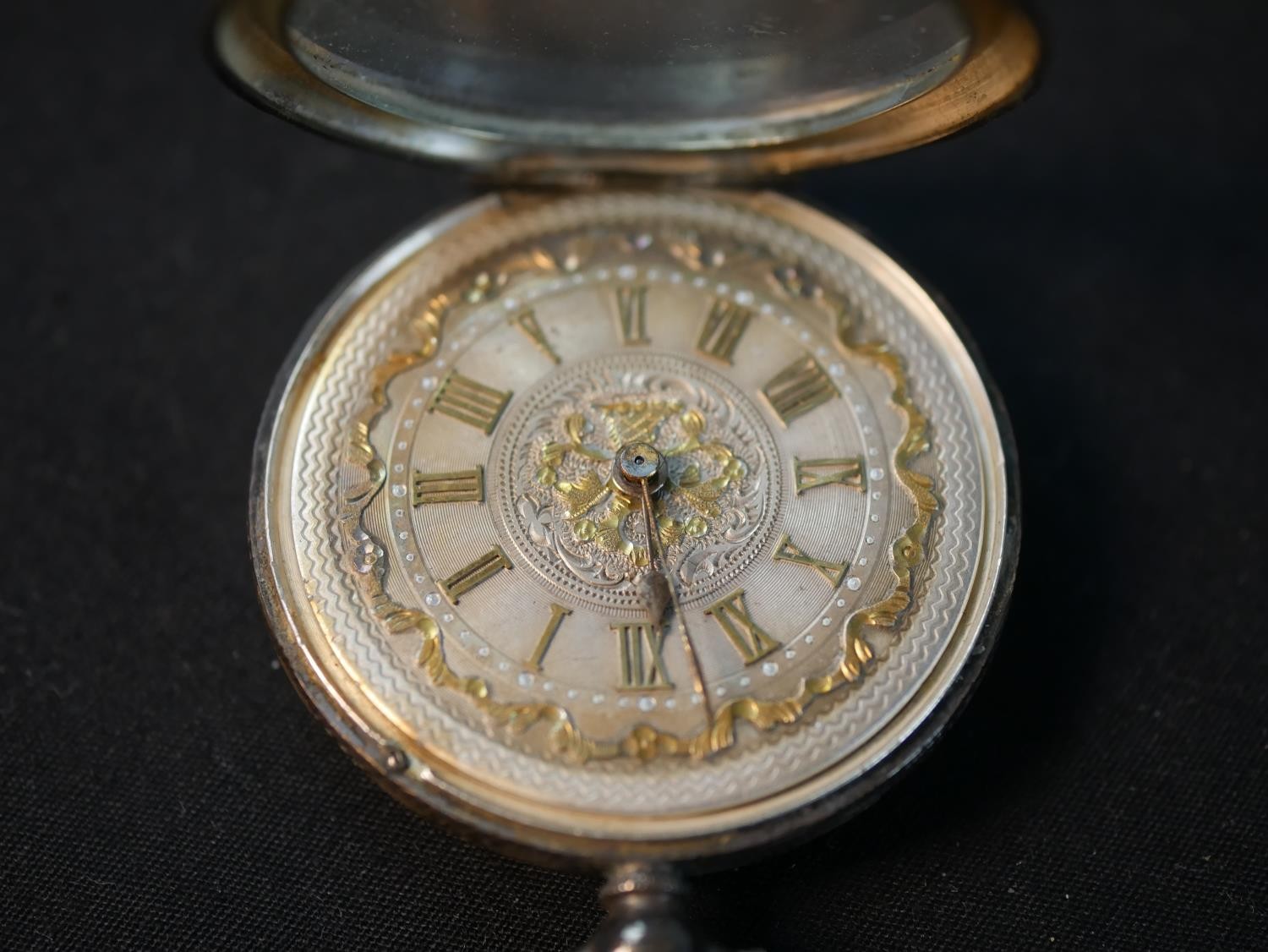 A silver carved and engraved Swiss fob watch. The dial with a carved fruit basket and foliate design - Image 5 of 9