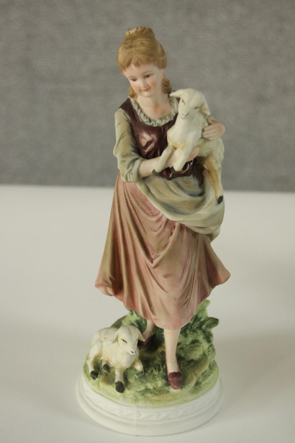 A collection of ten hand painted porcelain figures by various makers. Figures include a Lladro - Image 14 of 15