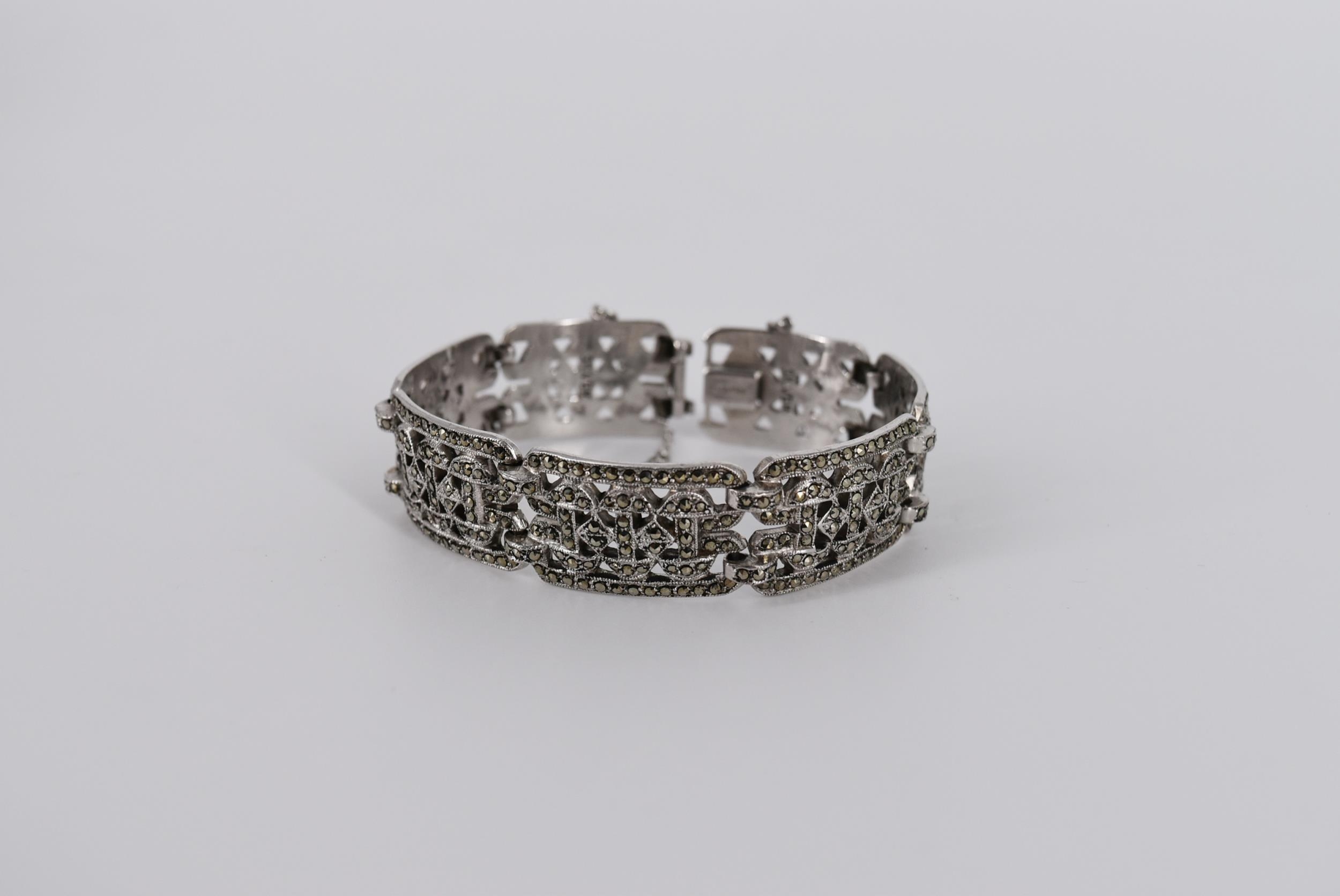 A boxed Art Deco marcasite and silver pierced geometric design bracelet with safety chain. Stamped - Image 4 of 6