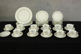 A Minton Spring pattern bone china part tea and dinner set, comprising cups, saucers and plates.