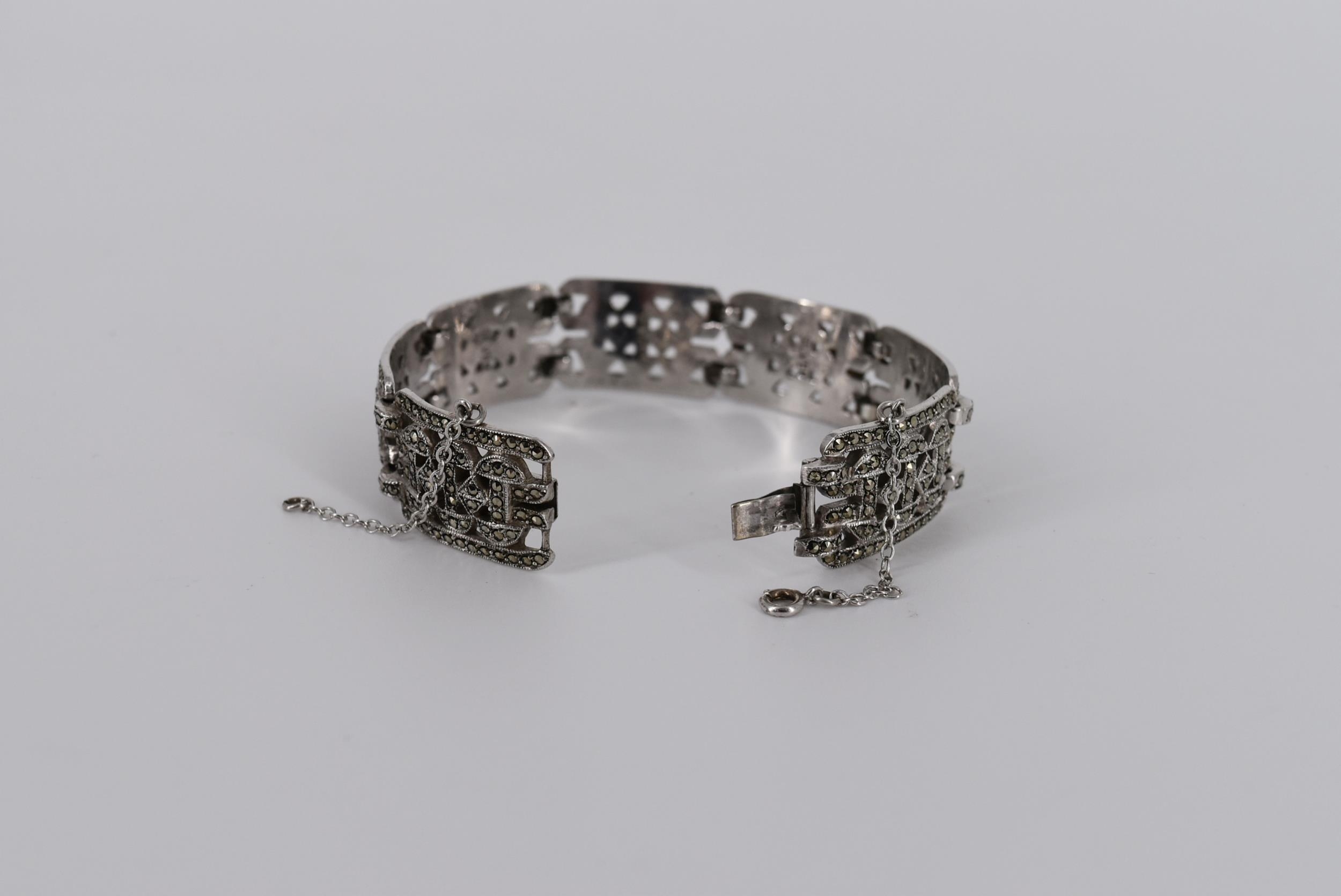 A boxed Art Deco marcasite and silver pierced geometric design bracelet with safety chain. Stamped - Image 5 of 6