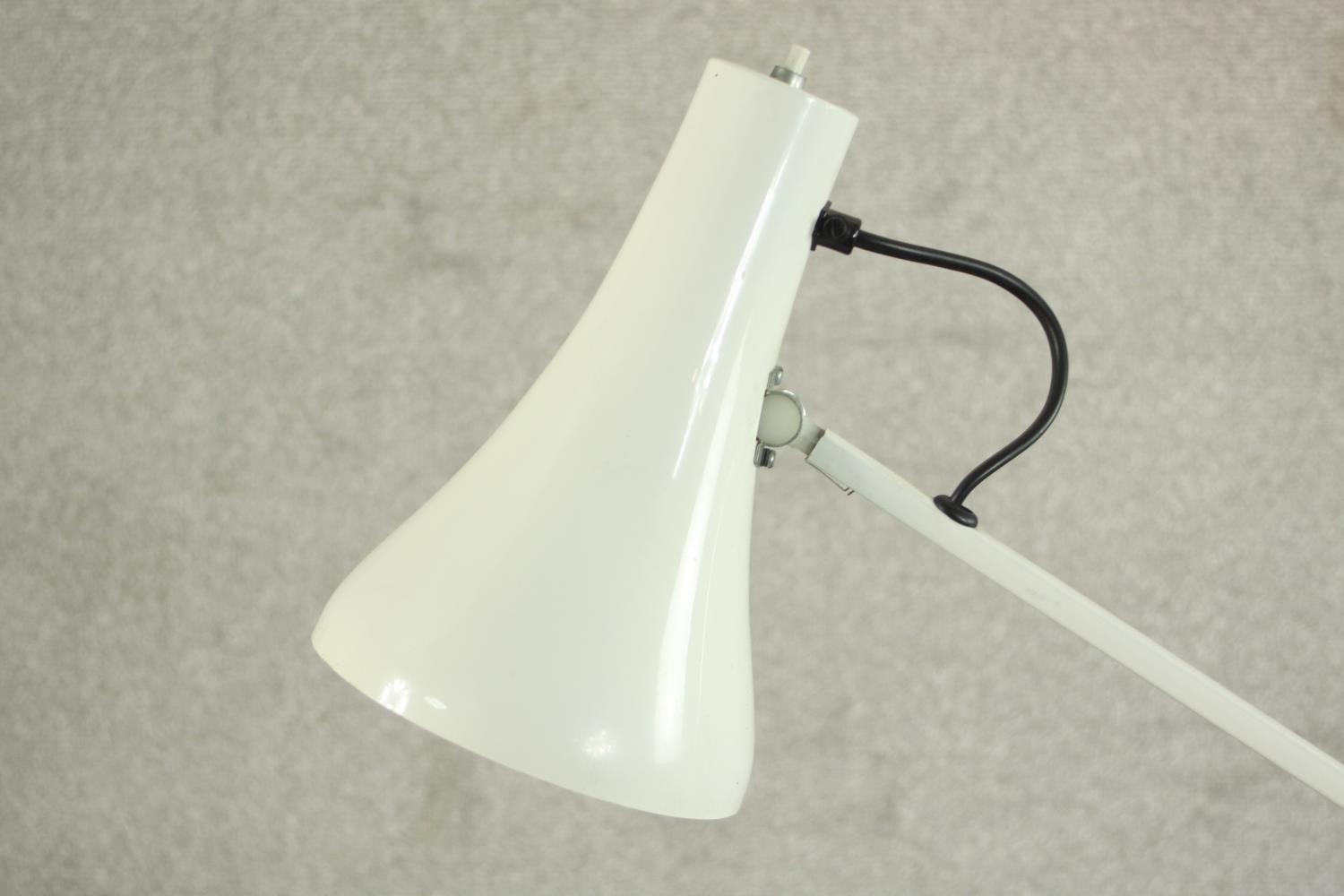 A mid 20th century Herbert Terry style anglepoise desk lamp, in white with a circular base. H.85 - Image 3 of 7