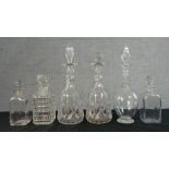 Six cut crystal and blown glass decanters, including a pair of 19th century square form decanters