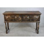 A late 19th century oak dresser base in the 17th century style, the rectangular plank top with