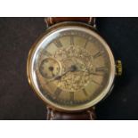 A yellow metal (tests as 9ct) Victorian automatic gentleman's wrist watch with small seconds dial.