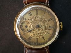 A yellow metal (tests as 9ct) Victorian automatic gentleman's wrist watch with small seconds dial.