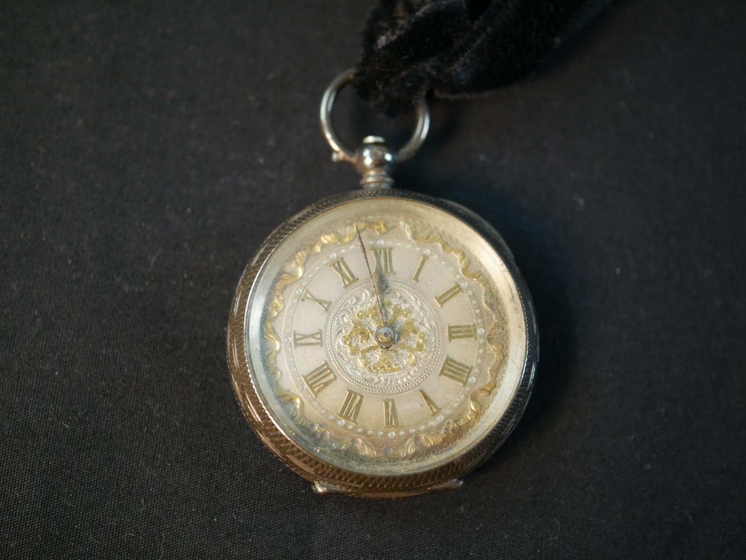 A silver carved and engraved Swiss fob watch. The dial with a carved fruit basket and foliate design - Image 2 of 9