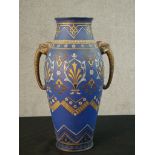 A 19th century Mettlach vase, Villeroy & Boch, slightly bulbous form with two side handles in the