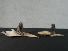 Marie Jones, Aboriginal drift wood and ceramic sculptures, one of an old man and one of a young boy,