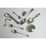A collection of novelty silver items, including a miniature Mexican hat with engraved design, a