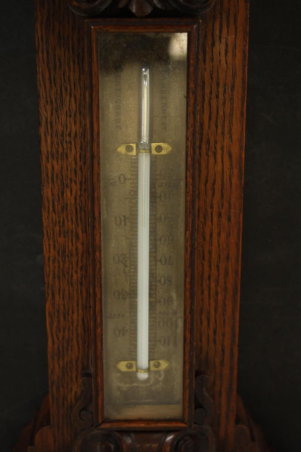 A circa 1900's Negretti & Zamba carved oak barometer and thermometer with shell and flower motifs. - Image 5 of 7