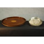 A late Victorian style mahogany oval twin handled galleried tray with sea shell motif to centre