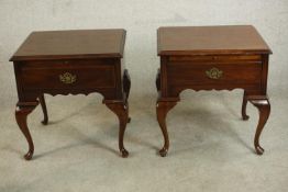 A pair of American 18th century Colonial style bedside tables fitted with brushing slide and