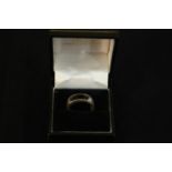 A boxed silver and Blue John modern dress ring, the front with a slice of Blue john on a wide flat