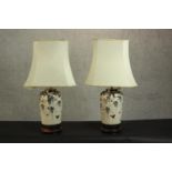 A pair of early 20th century Japanese lobed form Satsuma vases converted into table lamps, cream