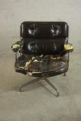 Charles & Ray Eames, an ES105 lobby chair, upholstered in dark chocolate brown leather (heavily worn