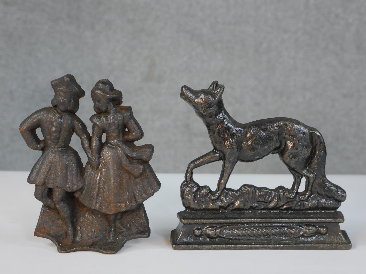 A collection of cast iron objects, comprising of two cold painted iron door stops in the form of - Image 4 of 5